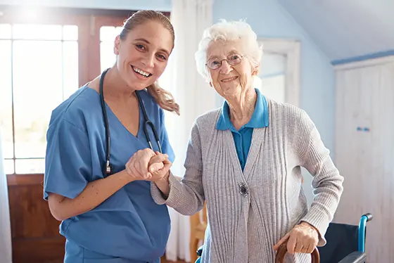 Older woman with a caregiver