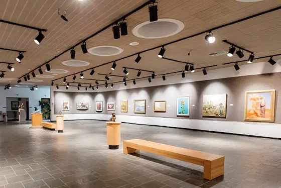 Large room with paintings display on the wall